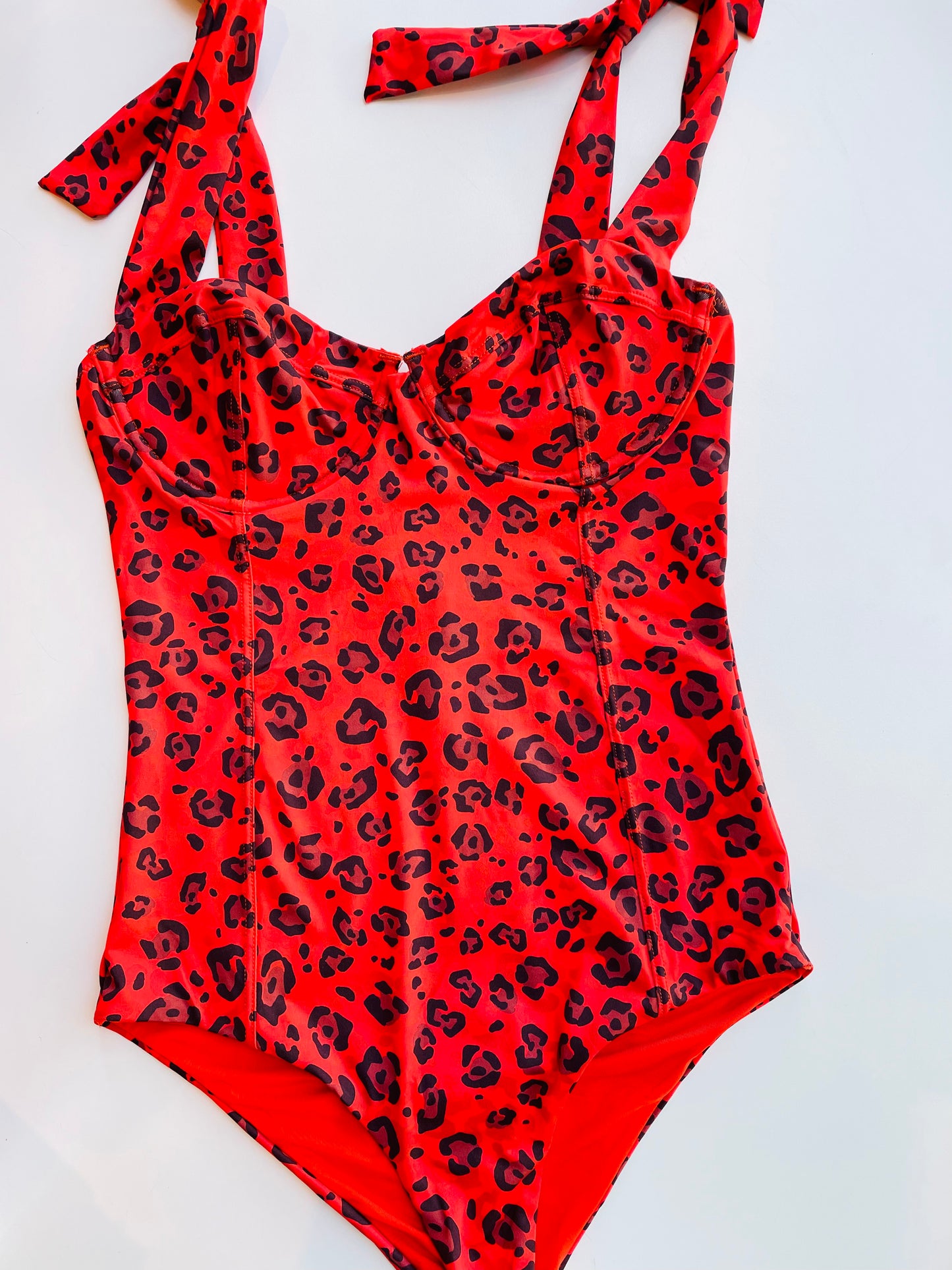 Costume intero leopardato rosso